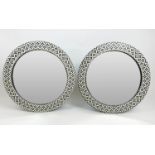 WALL MIRRORS, a pair, 1970's Italian design inlaid circular frames, 61cm diam. (2)