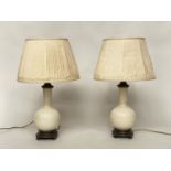 TABLE LAMPS, a pair, cream crackelure ceramic and bronze mounted of gourd form with silk pleated