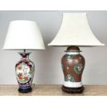 TABLE LAMPS, two, Chinese ceramic, one of temple jar form the other imari pattern, with carved