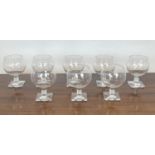 LALIQUE 'ARGOS' COGNAC GLASSES, a set of eight, signed to base. (8)