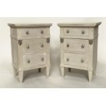 BEDSIDE CHESTS, a pair, Gustavian style grey painted and silvered metal mounted each with three