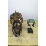 AFRICAN GURO TRIBAL MASK, ALONG WITH A BAMUM PEOPLE CURRENCY BRACELET. (2)