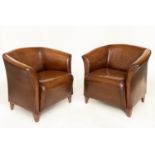 ARMCHAIRS, a pair, mid brown tan leather with outswept arms and splay supports, 76cm W. (2)