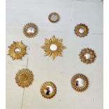 WALL CONVEX MIRRORS, a set of nine, 30cm diam at largest, Regency style, various sizes and