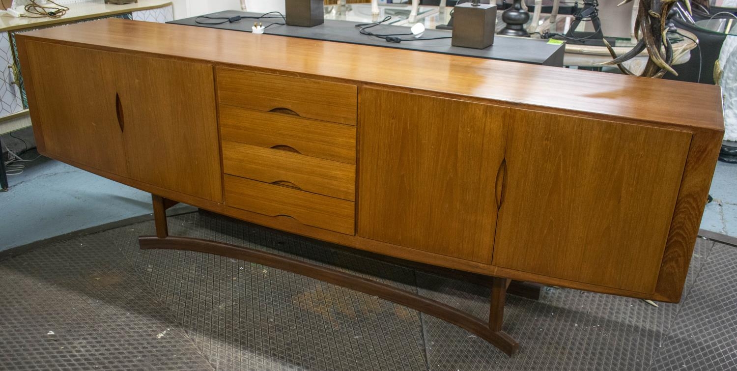 JOHANNES ANDERSON SIDEBOARD, circa 1960, 240cm x 49.5cm x 85cm, Danish teak, with four drawers