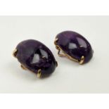 EARRINGS, a pair of amethyst cabouchon clip on earrings set in yellow metal, open backed, gross