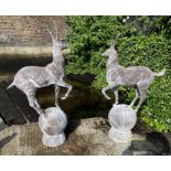 ARCHITECTURAL GARDEN STAG FINIALS, a pair, cast metal, 100cm x 60cm. (2)