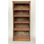 GLOBE WERNICKE BOOKCASE, a graduated set of five, oak stacking glazed with cornice, plinth and