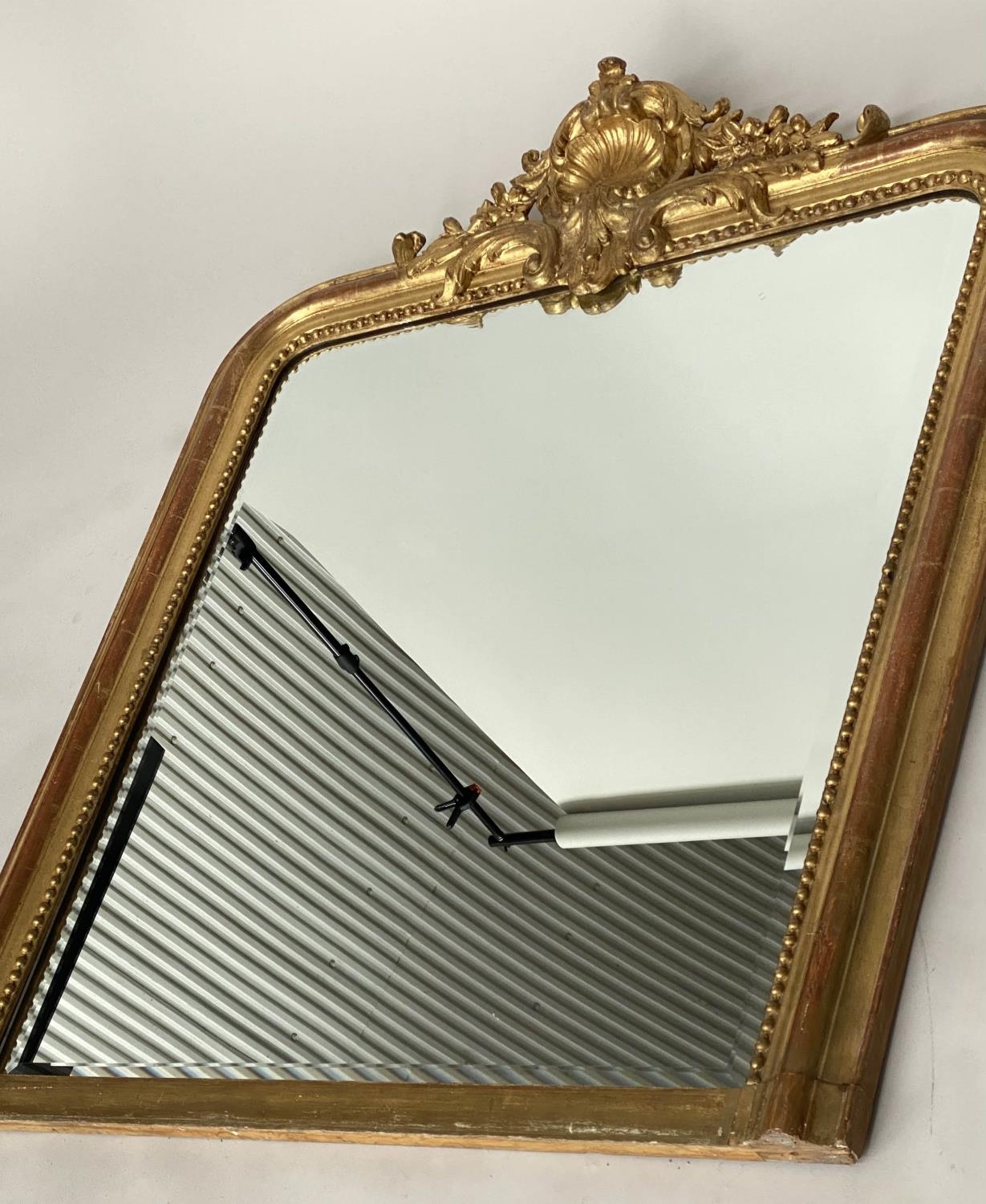 OVERMANTEL MIRROR, 19th century French giltwood and gesso moulded with arched beaded frame and shell - Image 5 of 5