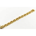 AN 18CT GOLD NUGGET MOTIF BRACELET, 19cm long, 24 grams.