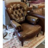 CLUB ARMCHAIRS, a pair, brown leather buttoned backs, spring seats, raised on turned supports,