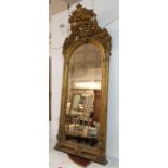PIER MIRROR, 183cm H x 73cm W, 19th century Continental giltwood and gesso with an elaborate