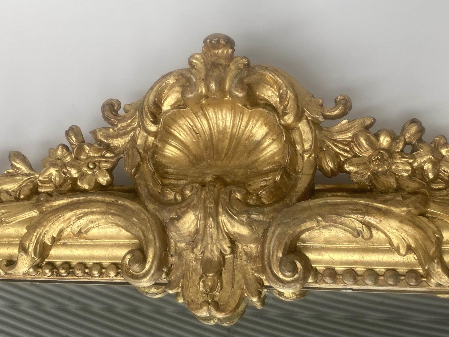 OVERMANTEL MIRROR, 19th century French giltwood and gesso moulded with arched beaded frame and shell - Image 4 of 5