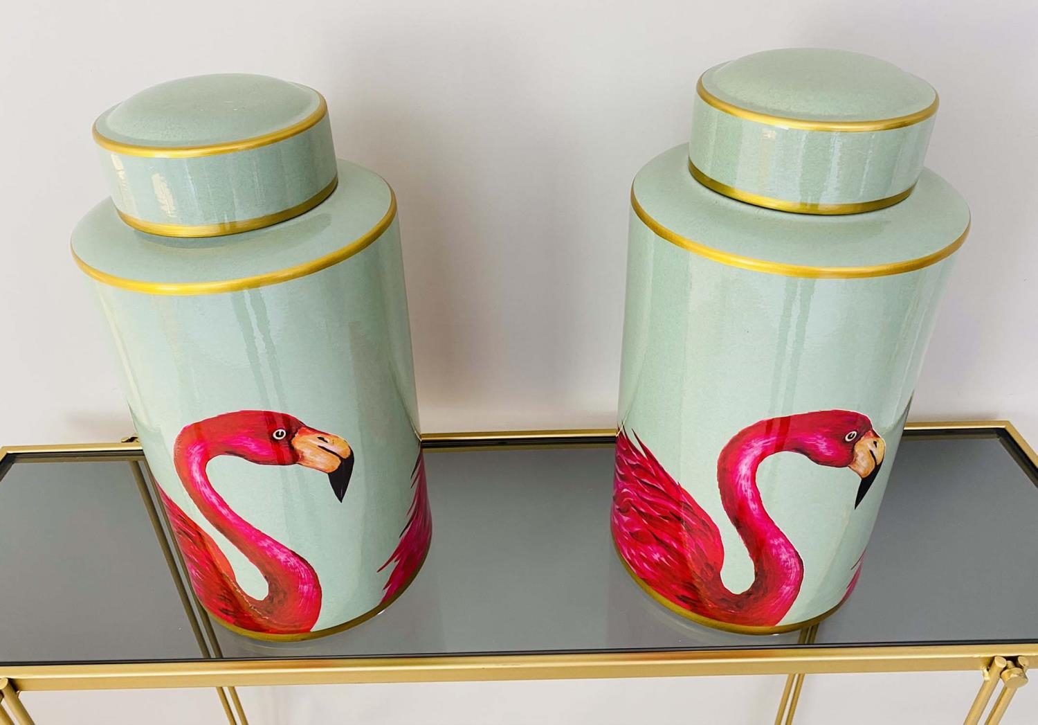 GINGER JARS, a pair, 40cm high, 20cm diameter, each glazed ceramic with flamingo design. (2)