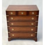 CAMPAIGN STYLE CHEST, brass bound with three short above four long drawers, 76cm x 90cm H x 46cm.