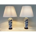 TABLE LAMPS, a pair, Chinese blue and white ceramic of vase form, with shades, 72cm H. (2)
