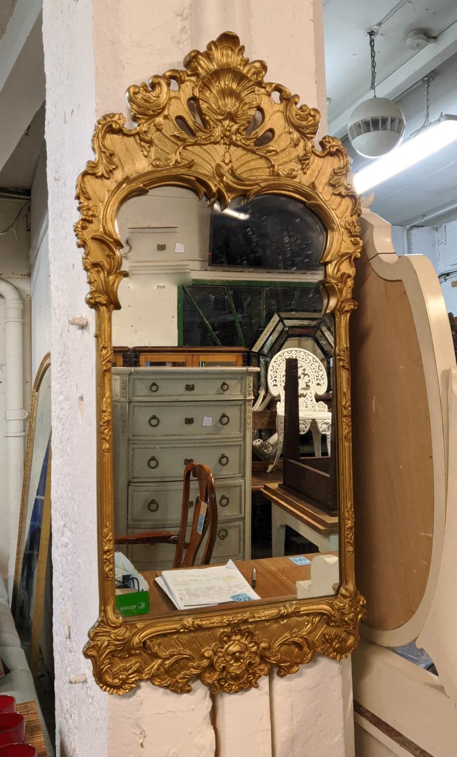 GILT METAL WALL MIRROR, baroque style, 99cm H x 45cm W.