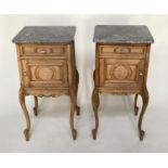 TABLES DE NUIT, a pair, French late 19th century oak each with marble top above a drawer and door,