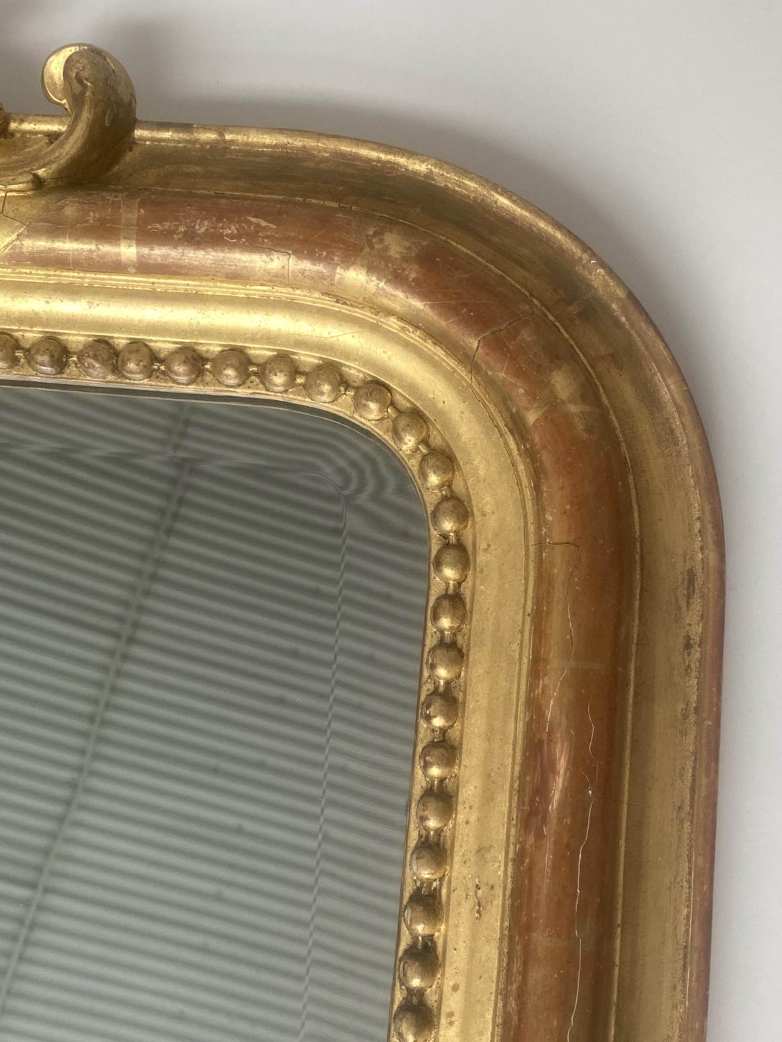 OVERMANTEL MIRROR, 19th century French giltwood and gesso moulded with arched beaded frame and shell - Image 3 of 5