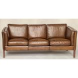 STOUBY DANISH SOFA, 1970s mid brown grained tan leather, three seater with teak supports, 200cm W.