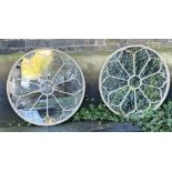 ARCHITECTURAL GARDEN WALL MIRRORS, a pair, circular Regency style design, 80cm x 80cm. (2)
