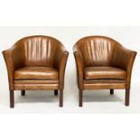 TUB ARMCHAIRS, a pair, mid brown piped leather with slightly raised backs and cushion seats, 75cm W.