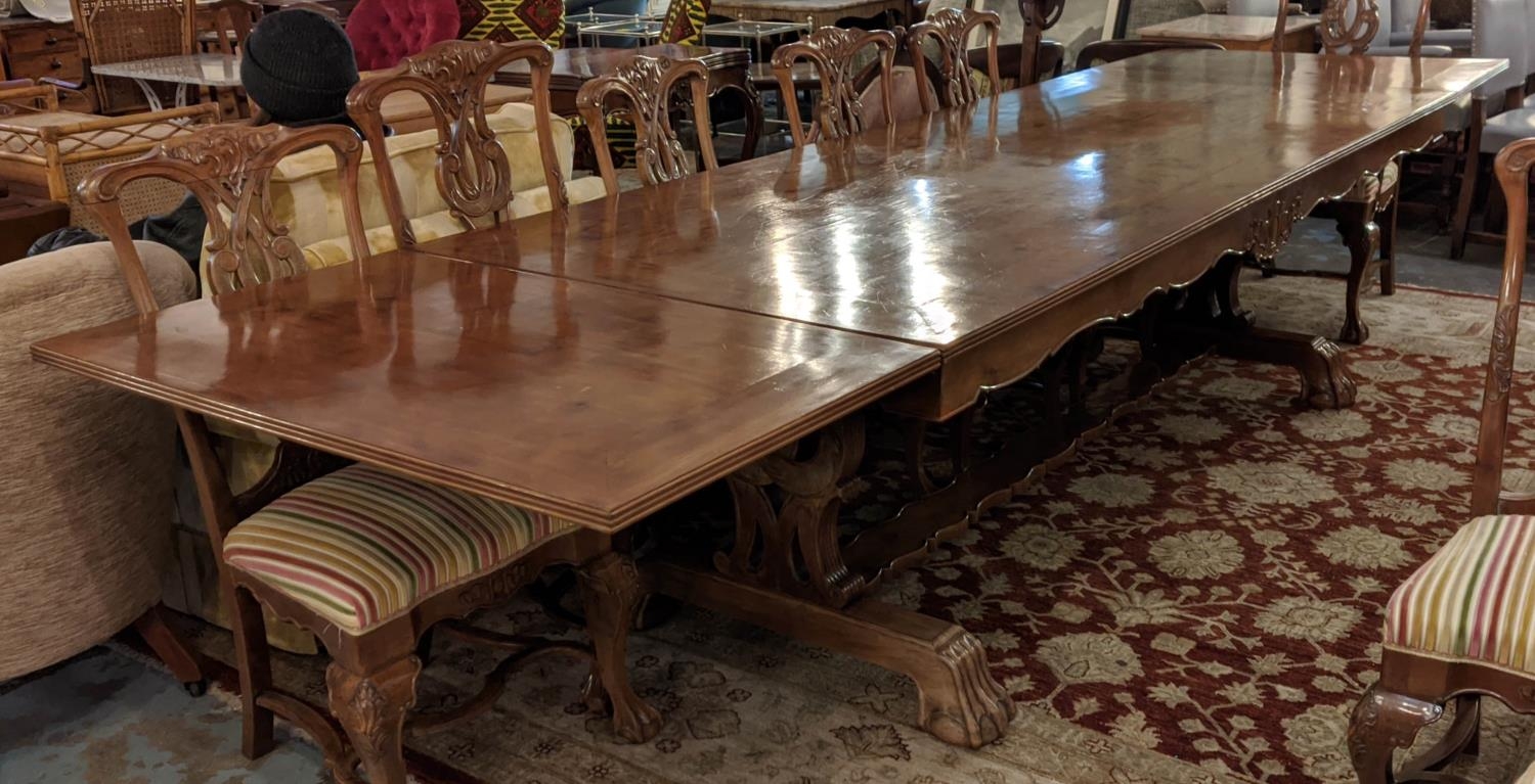 DRAW-LEAF TABLE, 372cm L extended x 81cm H x 105cm D 20th century Continental walnut on ornate