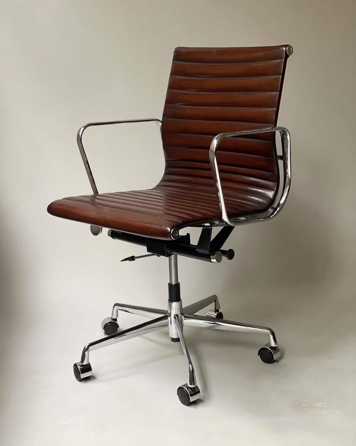 REVOLVING DESK CHAIR, Charles and Ray Eames inspired with ribbed tan leather seat revolving and