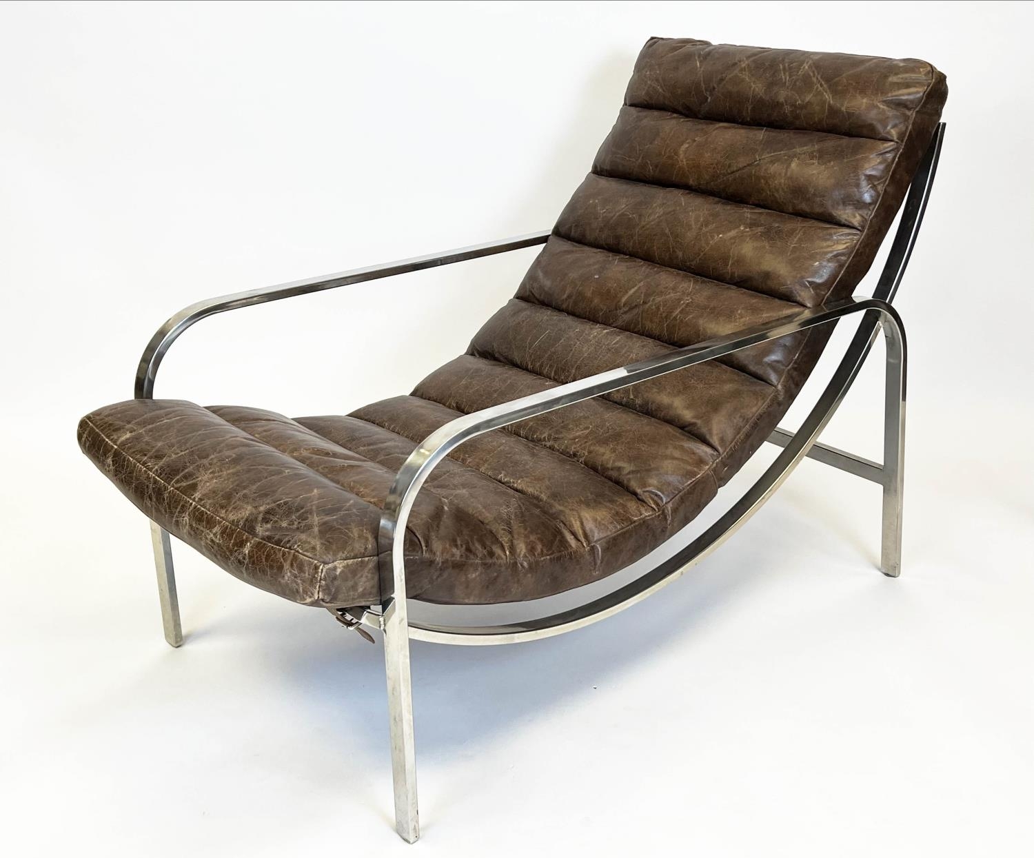 HALO SCOTT ARMCHAIR, ribbed brown leather with a stainless steel frame, 84cm H x 110cm x 63cm.