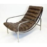 HALO SCOTT ARMCHAIR, ribbed brown leather with a stainless steel frame, 84cm H x 110cm x 63cm.