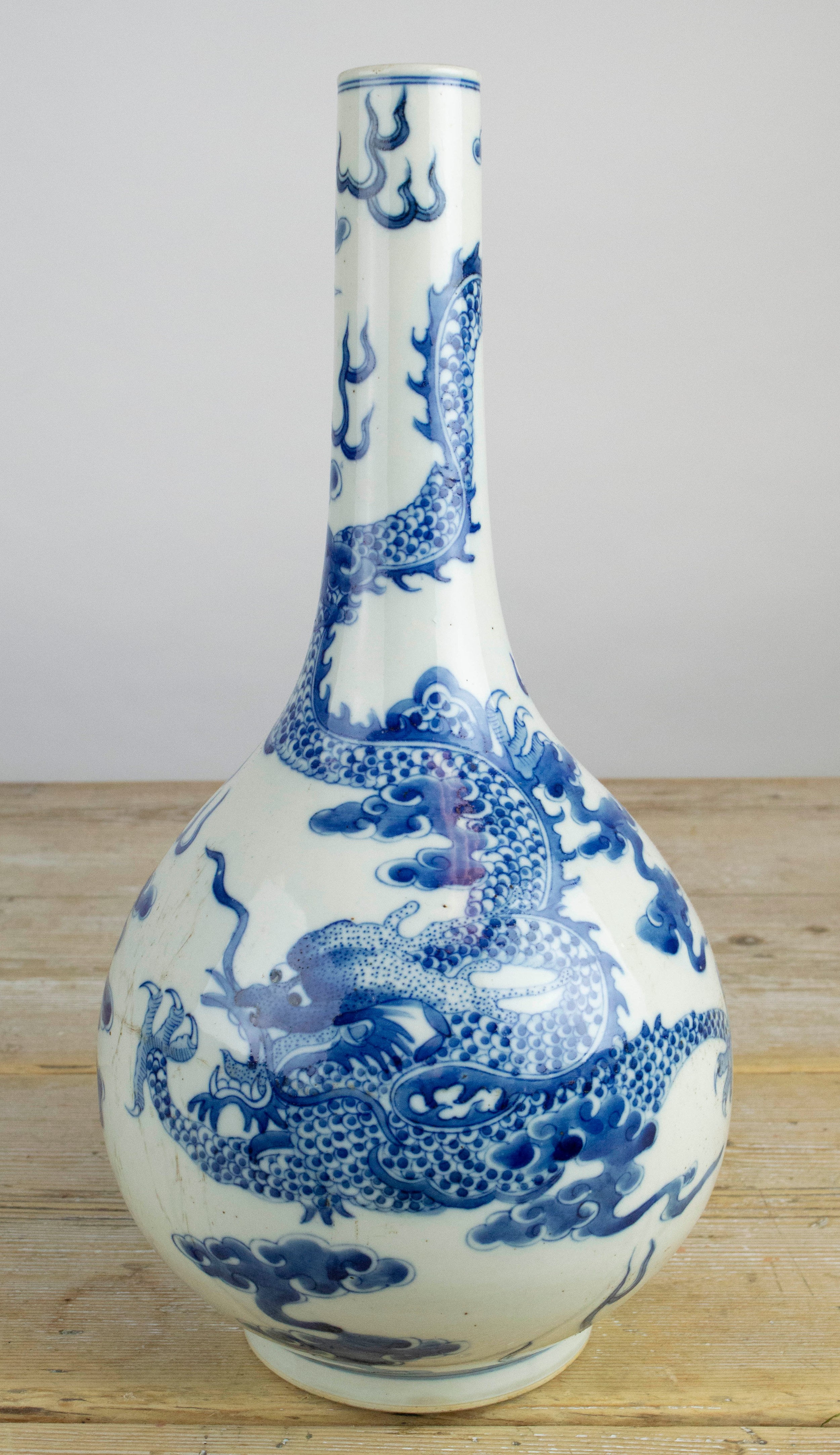 CHINESE 'DRAGON', blue and white bottle vase, the dragon chasing the flaming pearl of wisdom, 30cm