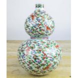 CHINESE DOUBLE GOURD VASE, Qianlong style, doucai decorated with repeat multi coloured enamel pattrn