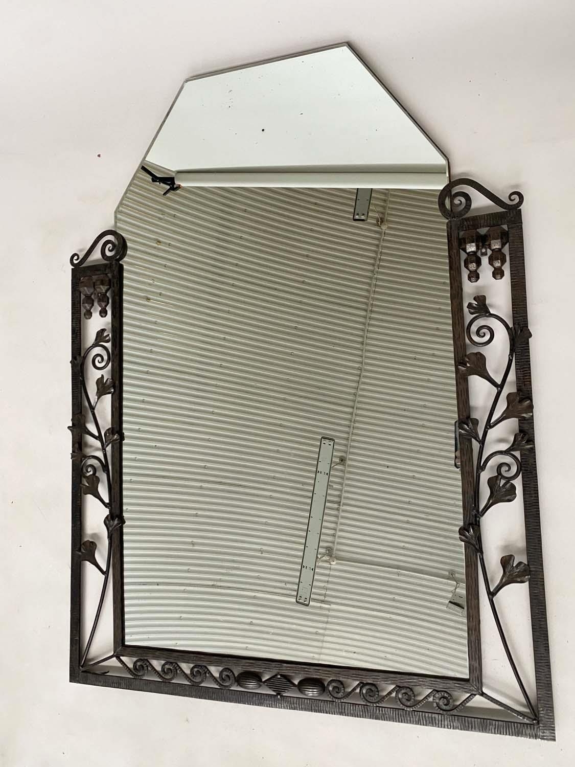 ART DECO WALL MIRROR, French bevelled tapering mirror within a wrought iron foliate and Vitruvian - Image 2 of 4