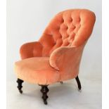 ARMCHAIR, Victorian walnut with 'plush' velvet upholstery, deep buttoned back and turned supports,
