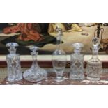 DECANTERS, five, cut glass including a pair with faceting etching. (5)