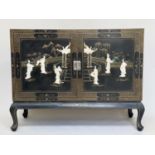 CHINESE CABINET, Chinese lacquered and Chinoiserie gilded and mounted with two sliding doors
