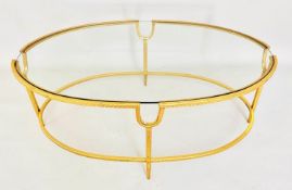 MAISON JANSEN STYLE COCKTAIL TABLE, gilt metal frame, inserted glass top, 38cm W x 96cm W x 59cm.