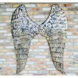 CONTEMPORARY SCHOOL WALL RELIEF, wings of the angle, silvered metal, 160cm x 120cm x 6cm.