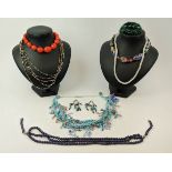 A collection of assorted jewellery comprising a Murano glass graduated bead necklace, an amber-