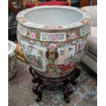 CHINESE CARP BOWL, on stand, famille rose, hand painted and gilded, raised on a lacquered stand,