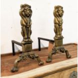 FIRE DOGS, a pair, 43cm H, gilt metal lion form. (2)