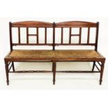 HALL BENCH, late 19th century English walnut in the manner of Jas Shoolbred with raised back and
