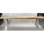 BENCH, 19th century French Provincial weathered pine rectangular thick top with splay supports,