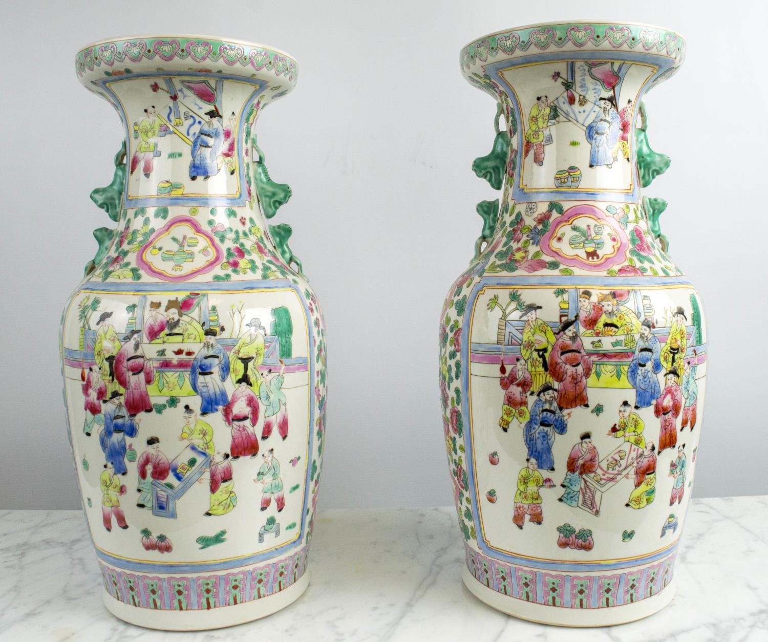CHINESE FAMILLE ROSE VASES, a pair, with courtyard scenes, 46cm H. (2)