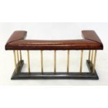CLUB FENDER, early 20th century studded tan leather continuous seat raised upon brass balustrade