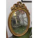 WALL MIRROR, 110cm x 76cm W, 19th century French giltwood with decorative ribbon surmount and oval