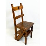 METAMORPHIC LIBRARY CHAIR, Victorian oak, hinged to form four tread steps, 91cm H x 42cm W.