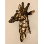 GIRAFFE HEAD WALL RELIEF PLAQUE, 75cm high, 42cm wide, 23cm deep, gilt metal finish.