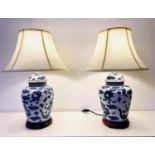 TABLE LAMPS, pair, 60cm high, 40cm diameter, Chinese export style blue and white ceramic with dragon