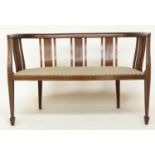 HALL SEAT, early 20th century Edwardian mahogany with enclosed slat back and studded linen